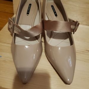 Tan point toe heels